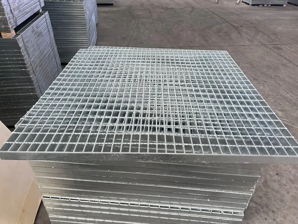 Stacked steel grating walkway panels.